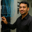 Systems administrator monitoring infrastructure and applying ITIL 4 practices